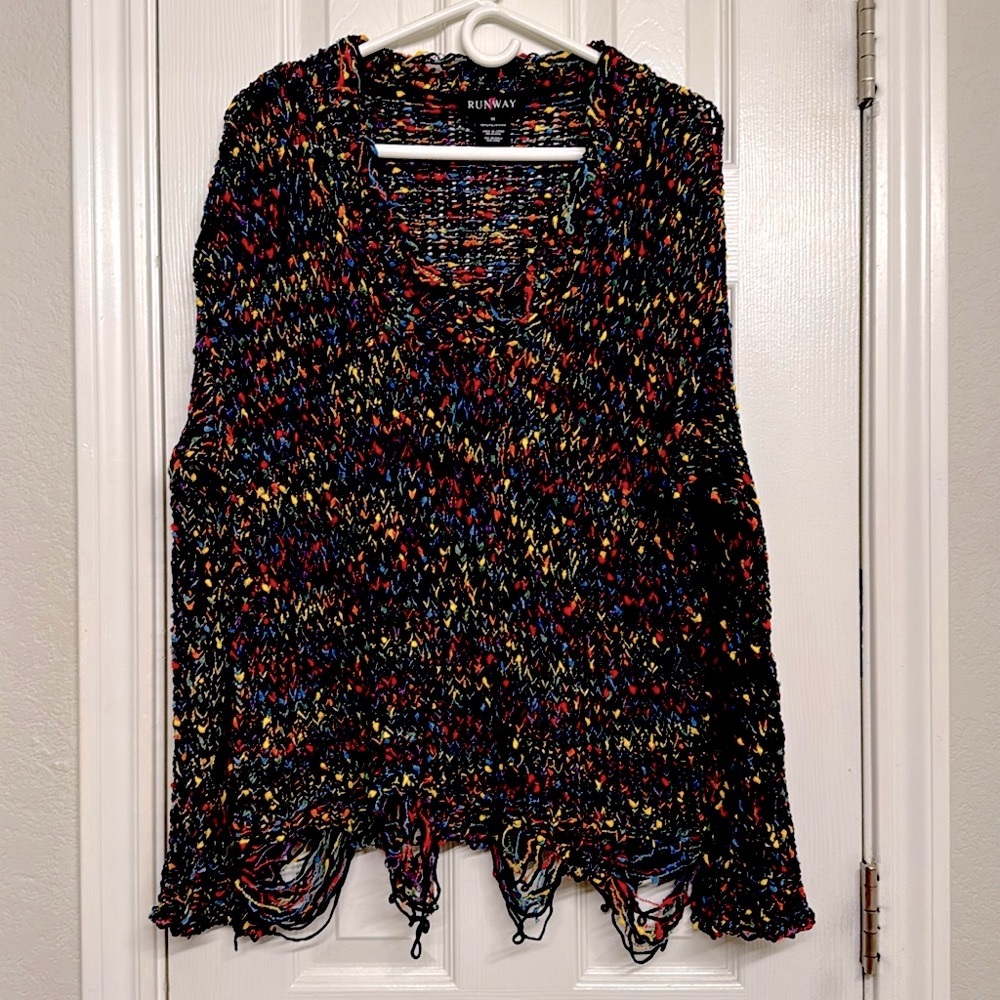 Crocheted Sweater with Distressed Hem